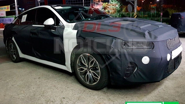 В сети появились дебютные шпионские фото Kia Optima Hybrid