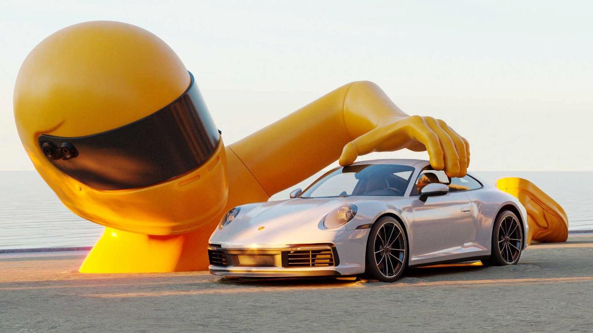 Компания Porsche представила статую ребенка, играющего с машинкой