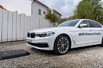 BMW испытывает беспроводную зарядку для электрокаров 530е