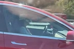 Очевидцы запечатлели очередного спящего за рулем водителя электромобиля Tesla