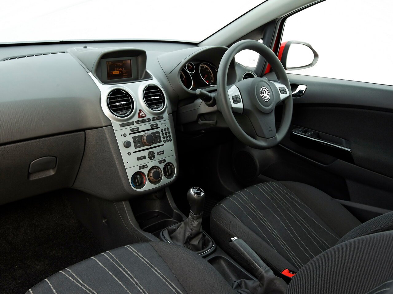 Расход опель корса д. Vauxhall Corsa d. Opel Corsa 3 Door Interior. 2009 Vauxhall Corsa. Опель Корса 3-х дверная.