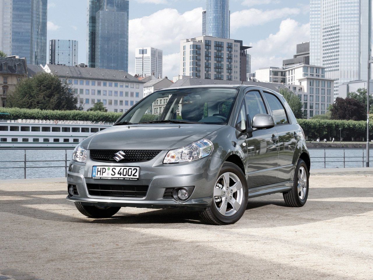 Suzuki SX4 I (Classic) Рестайлинг 2009 – 2014 Хэтчбек 5 дв.: кузов, класс,  тип и объём двигателя, коробка передач, разгон, фото - CarsWeek.ru