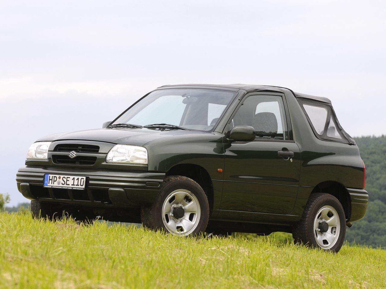 Suzuki Grand Vitara II Рестайлинг 2000 – 2006 Внедорожник открытый: кузов,  класс, тип и объём двигателя, коробка передач, разгон, фото - CarsWeek.ru